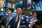 Traders work on the floor of the New York Stock Exchange shortly after the opening of the markets in New York September 16, 2015.  REUTERS/Lucas Jackson