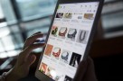 The eBay Inc. application is demonstrated on an Apple Inc. iPad Air in this arranged photograph in Washington, D.C., U.S., on Friday, April 25, 2014. EBay Inc. is expected to release earnings figures on April 29. Photographer: Andrew Harrer/Bloomberg via Getty Images